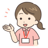 案内している笑顔のポロシャツの女性
