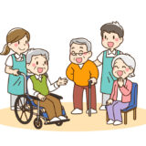 介護施設で楽しく話す笑顔の高齢者達